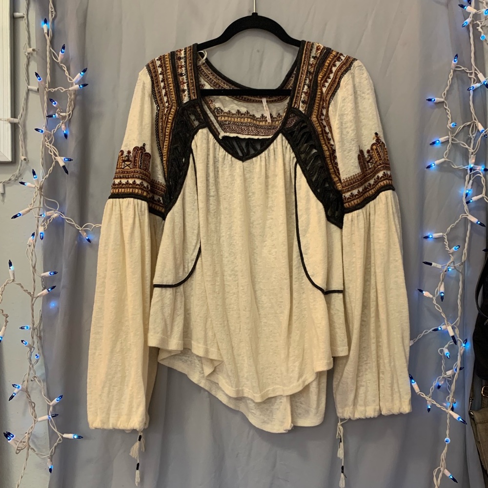 Free People Flowy shirt.